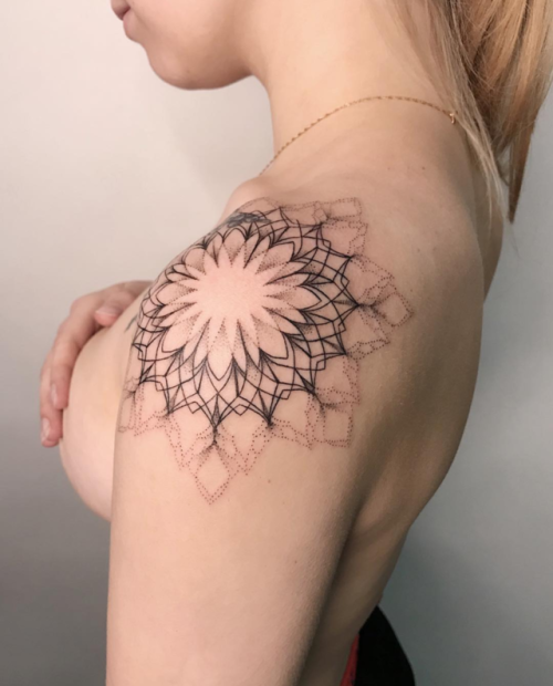 geometric tattoos — Shoulder mandala by dasha_sumtattoo on Instagram