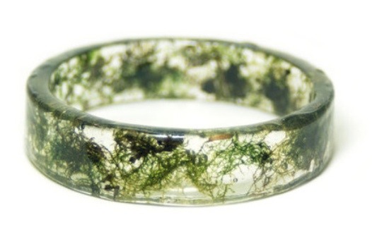 craftyallegieancequestioners:Amazing resin bracelets on  http://faeriemag.com  These