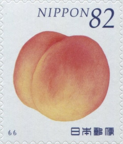 two 2014 Japanese stamps from a series on fruits and vegetables[id: two postage stamps, both with de