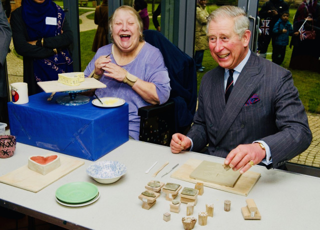 16 February 2012 | Prince Charles, Prince of Wales visits with Maureen King as they use stamping tools at the Bromley by Bow Centre, a multi eight faceted community enterprise centre in Tower Hamlets in London, England. (c) Arthur Edwards - WPA Pool/Getty Images #Maureen King#Prince Charles #Prince of Wales #Britain#2012#Arthur Edwards#WPA Pool#Getty Images