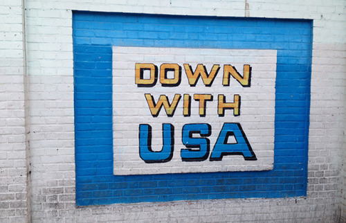 Anti-American murals painted on the old US embassy in Tehran