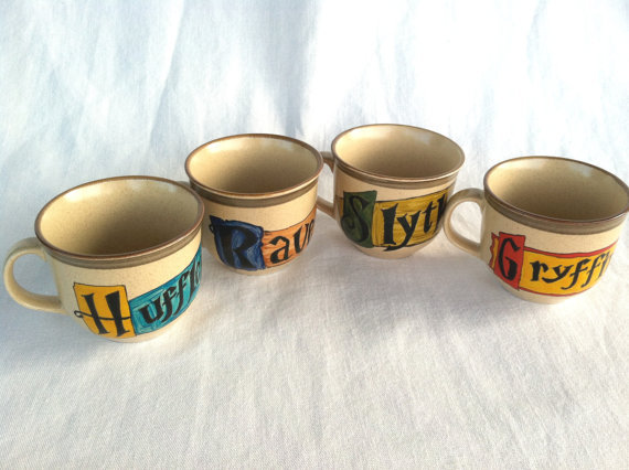 wickedclothes:  Harry Potter Hogwarts Crest Tea Set A massive crested tea pot, and