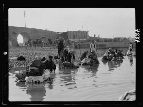 sniper-at-the-gates-of-heaven:washing clothes in the tigris river, mosul, 1932