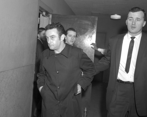 Lenny Bruce being arrested for obscenity and George Carlin being arrested for refusing to show his I