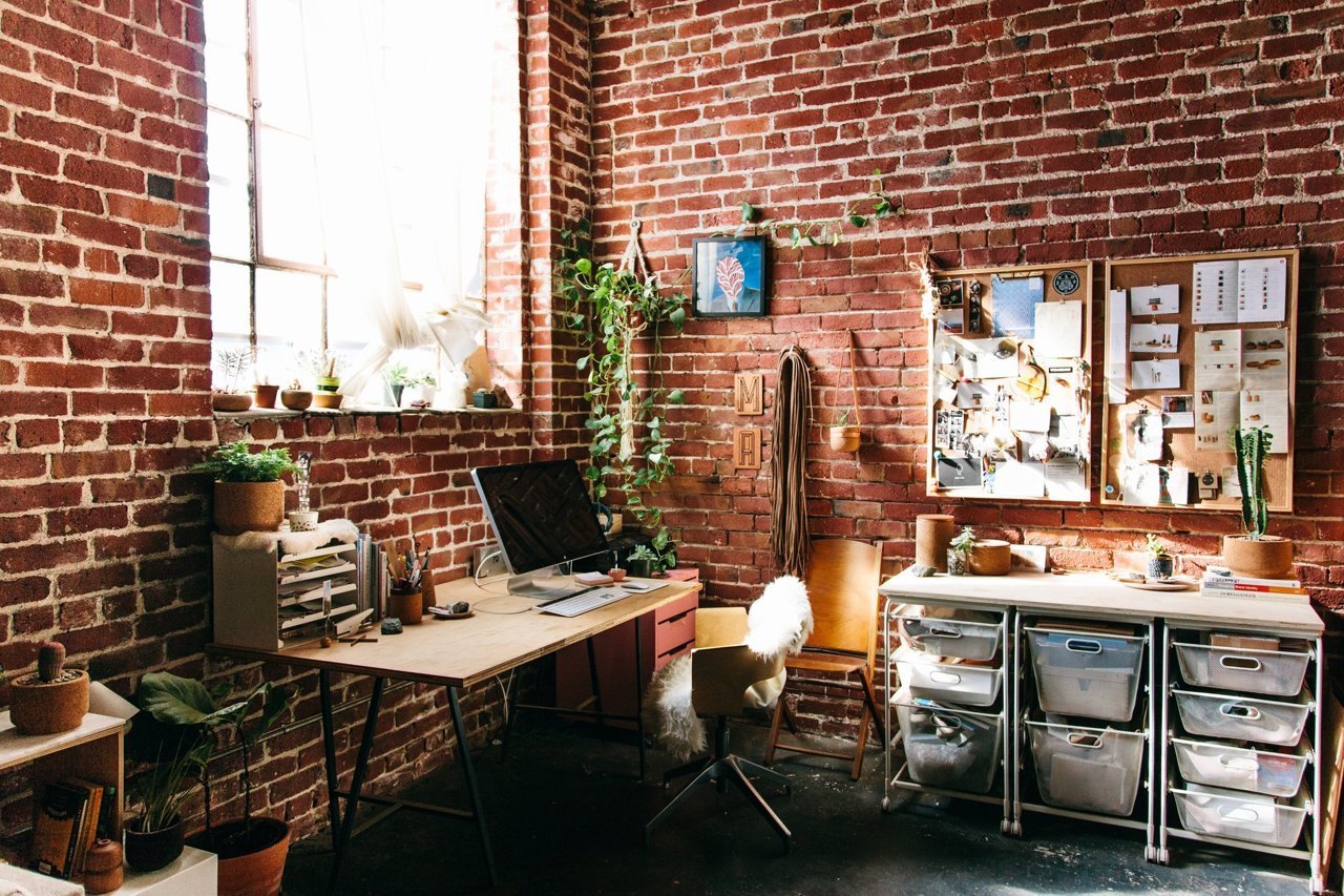 gravity-gravity:  Workspace with exposed brick via Apartment Therapy