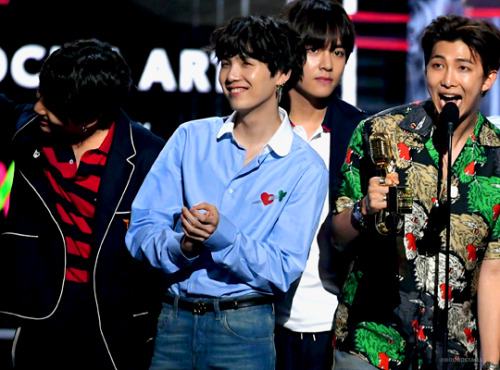 jikookdetails: BTS accepts an award onstage during the 2018 Billboard Music Awards at MGM Grand Gard
