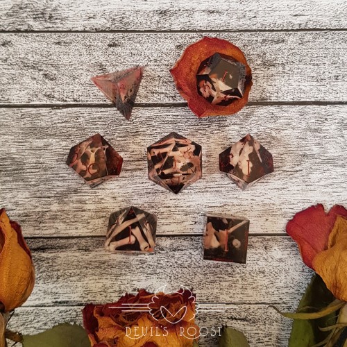 Graveyard Romance- sharp edge dice set with real bones.You can’t spell ‘necromancer’ with out romanc