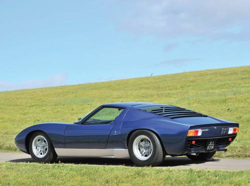 45-9mm-5-56mm:  megadeluxe:  1971 Lamborghini Miura P400 S  One of my favorite sports cars of all time. Timeless design.   Best looking design ever produced.  Not my favorite color for a Miura but it doesn’t hold it back much.