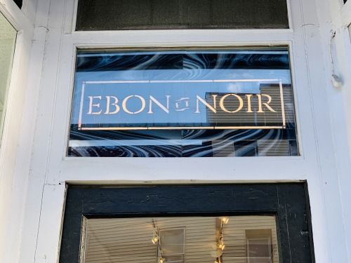 This weekend we finished the stained glass sign for the Ebon et Noir store and installed it along wi