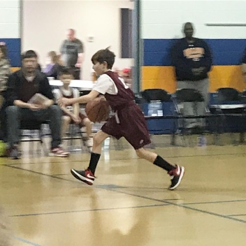 Only a few games left! Our boy killed it today! He made 4 baskets and is getting much better with gu