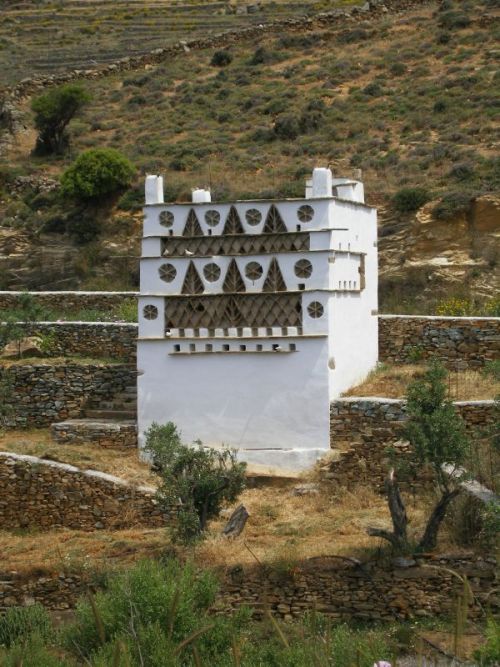 Examples of the traditional dove cotes of Tinos, Cyclades Islands, Greece. Sources in the photo capt