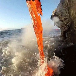 onlylolgifs:Lava spilling into the ocean 