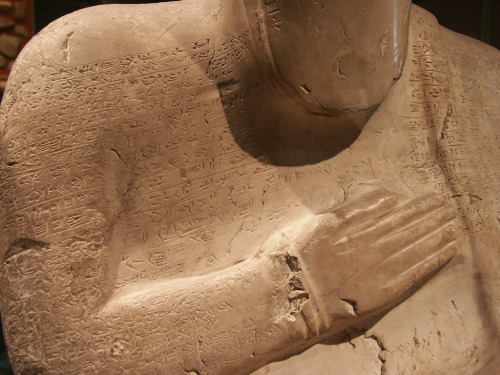 Details of the Statue of Idrimi showing the biography written in cuneiform which covers it. This scu