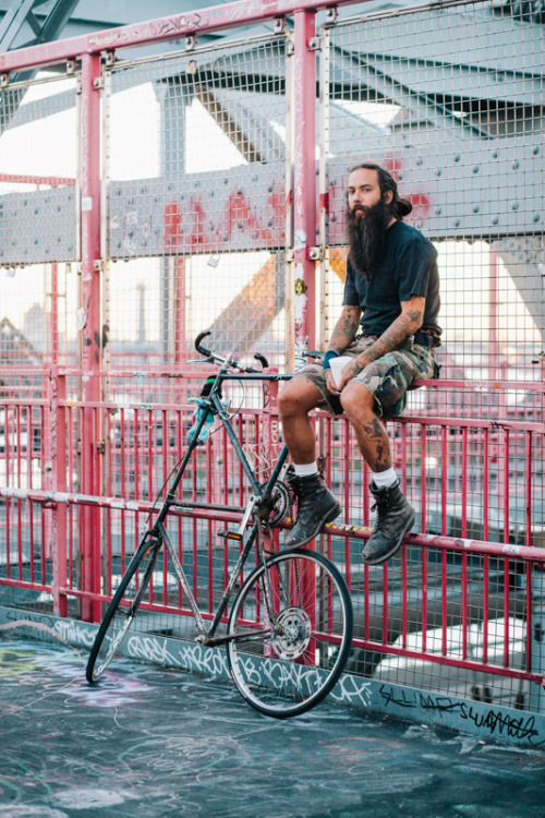 preferredmode:  Ian, with a his custom #tallbike on the #williamsburgbridge. #bikenyc