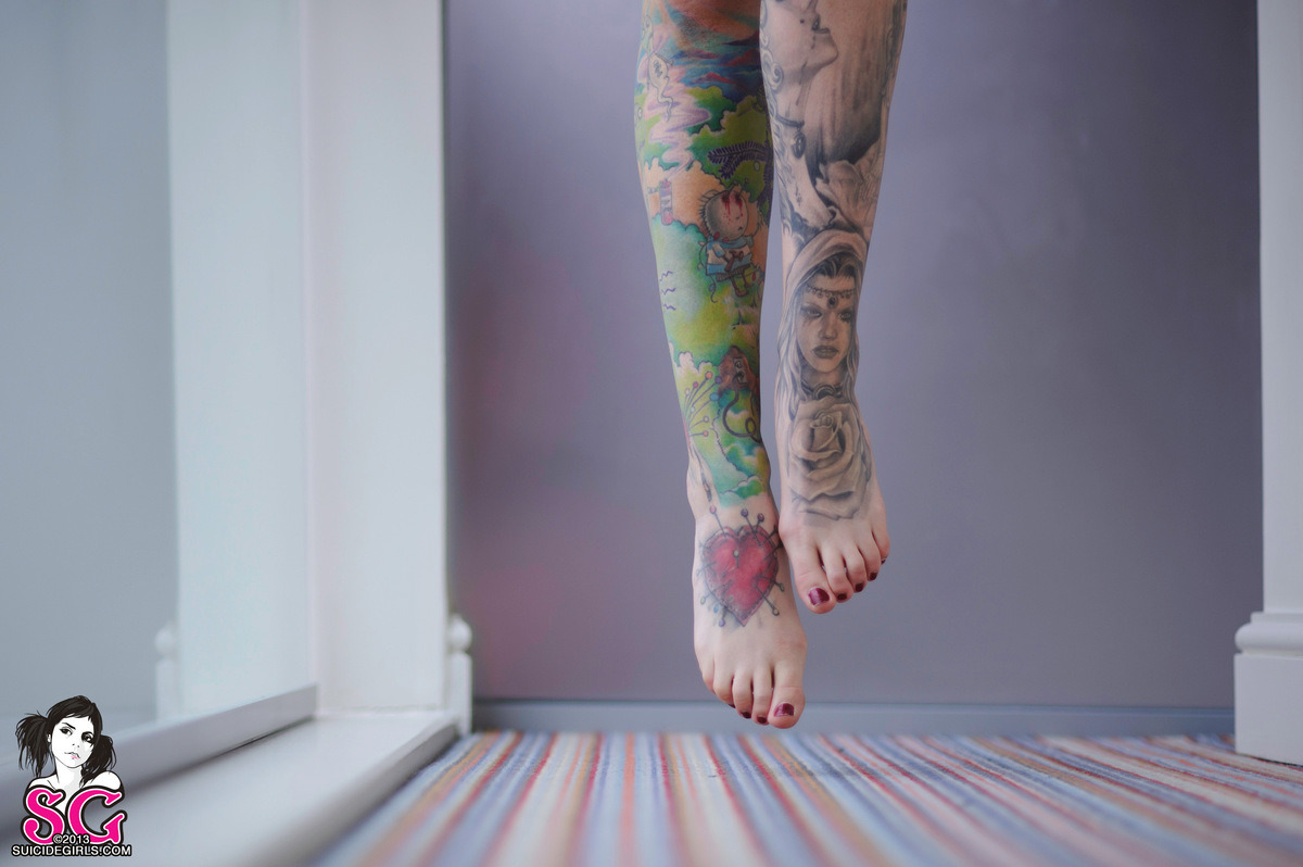 past-her-eyes:  Discordia Suicide For more South African SuicideGirls Sweet tattoo,