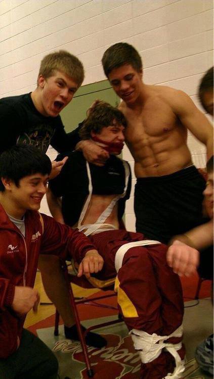 manicures-and-brownies:  demi-lovatoast:  ohdamnjulianne:  perfectlyquaint:  eren-corporal-rivaille:  “This a photograph taken from the teenager (shirtless guy) named Austin Schafer’s Twitter account, of a kid being tied up and beaten by upper classmen