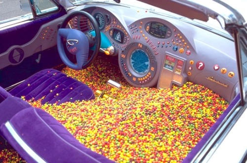 y2kaestheticinstitute:  Blobby dashboard design & excessive product placement of the ‘Gadgetmobile’ (Inspector Gadget - 1999)