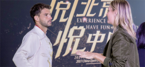 Maria Sharapova and Grigor Dimitrov talking at the 2017 China Open player’s party.