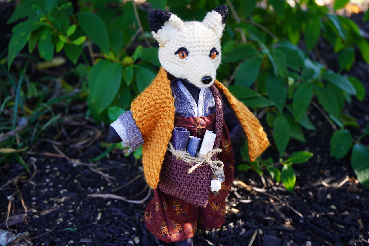 Amaranth Hollow — Crocheted kitsune with handsewn body and clothes....