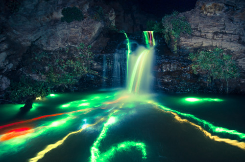 Glow sticks in a waterfall. http://www.fromthelenz.com/neon-luminance/