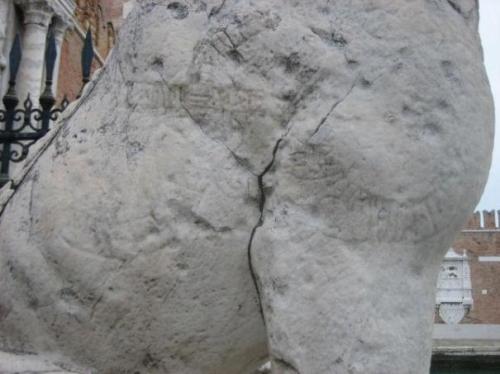 peashooter85:Viking runes on an ancient Greek statue,The Piraeus Lion is a marble statue around 3 me