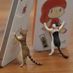 1nstant-qway:  catsbeaversandducks:  Cat Scratching Post iPhone Stand by Kitan Club. Photo by ©yoppy   NEED