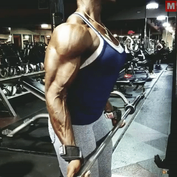 masterfbb:Big muscles over 40Master female bodybuilder training biceps44 years oldView