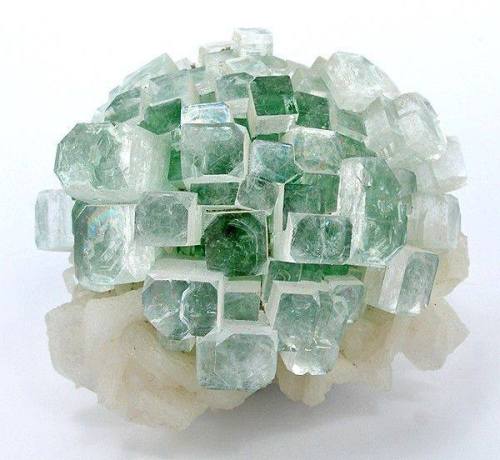 Apophyllite While some minerals are singletons, many occur in groups with different varieties, one n