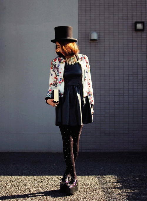 Black opaque tights with white dots, navy blue dress and floral jacket