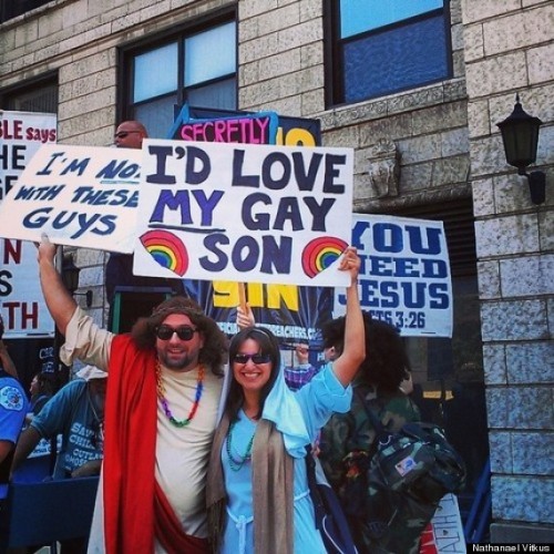 saevuswinds:  thegailygrind:  Cool Jesus at Chicago pride  I’m still laughing at that police officer he’s all like, “God bless you go Jesus” 