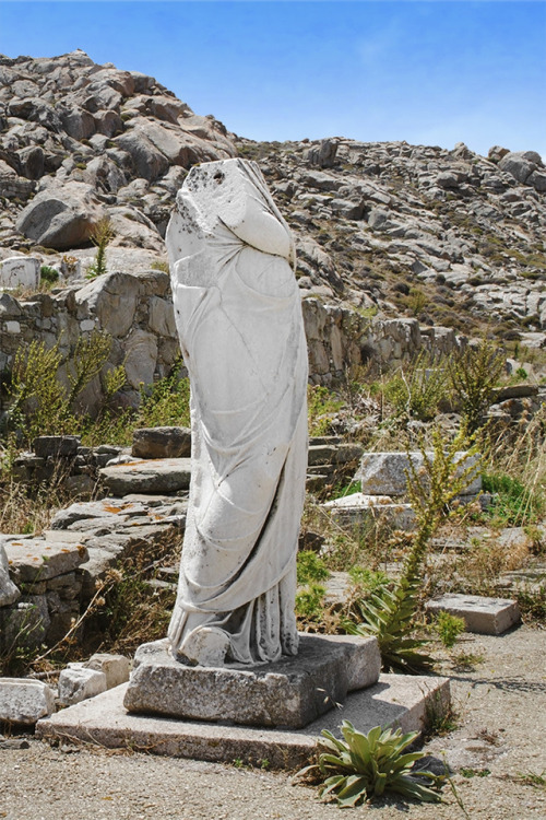 Headless statue standing at the ruins of Delos, GreeceGreece | Ancient ruins