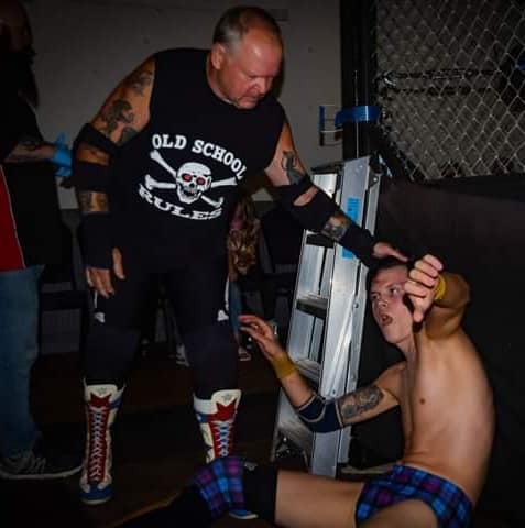 DANNY GOLD (JOBBER) DESTROYED  BY VETRON {HEEL) BOB BARRATT IN A HARDCORE CAGE MATCH LAST MONTH