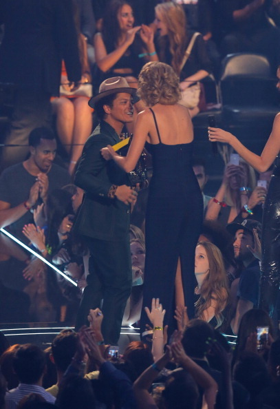 Bruno Mars News — Taylor Swift and Bruno Mars onstage during the...
