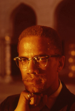 twixnmix:   Malcolm X photographed by John Launois in Cairo, August 1964.   