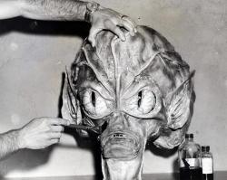 arcaneimages:            Paul Blaisdell puts some finishing touches on an alien mask for “Invasion of the Saucer Men” 1957.— via William Forsche.                     