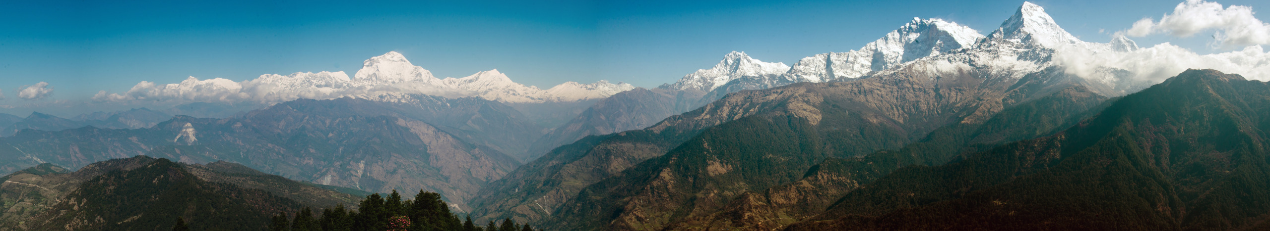 I spent my last week up in the Himalayas. There, I popped my 4,000 meter cherry (and surprisingly not my ears!) I also shot my first panorama.
This is the Annapurna mountain range – crowned by Annapurna I, the tenth highest and arguable one of the...