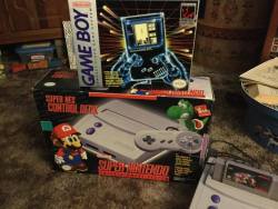 theomeganerd:  A friend of mine dug out some old video games and I snapped a few photos. I’ve not held a Game Boy since I was a kid. So much nostalgia. I was in shock that she still had some of the original boxes. Album also available on Imgur