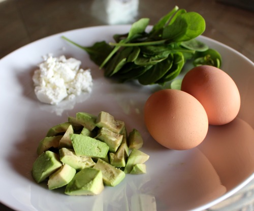 My favorite breakfast: Two scrambled eggs with spinach, avocado and goat cheese! 