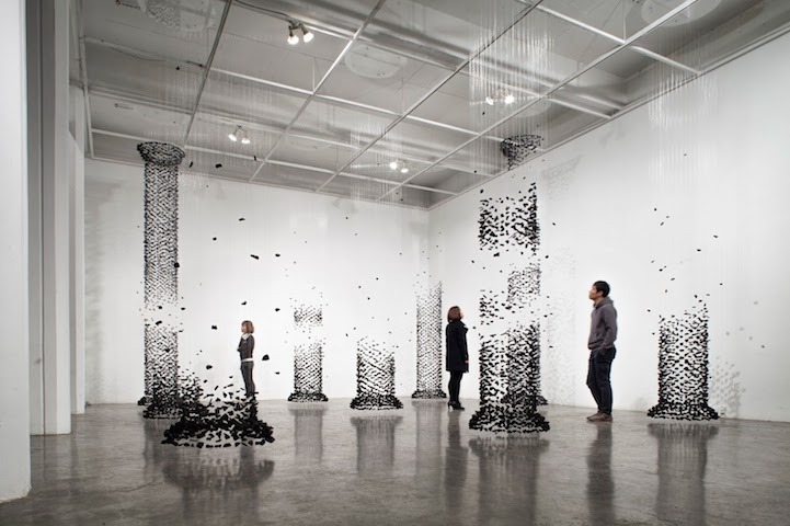 jedavu:  Columns of Suspended Charcoal Explore Relationship Between Nature and Man