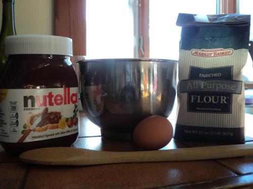 shiningsparrow:  3 Ingredients Nutella Cookies: 1 Egg 1 Cup Flour 1 Cup Nutella Mix ingredients well in small bowl. Bake for 6-8 Minutes at 350(they are so easy and delicious! :))  