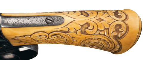 An exhibition engraved and gold inlaid Deane Adams double action revolver with carved ivory grips, o