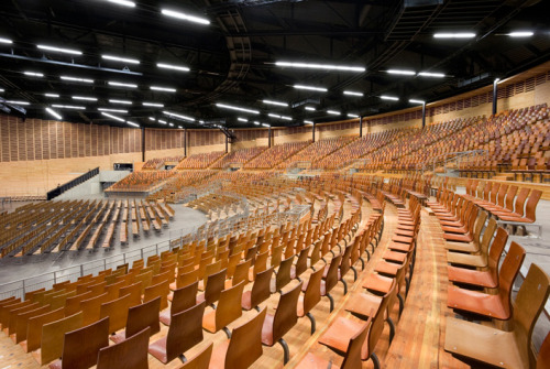 archatlas:  Limoges Concert Hall Bernard Tschumi Architects “The concept for the project began with a double envelope: an outer skin made of wood arcs and translucent rigid polycarbonate sheets and an inner acoustical envelope of locally grown