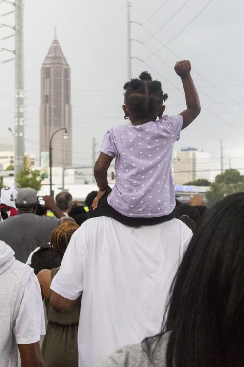 candidinatlanta:  “As the protesters marched through the streets, it began to storm. Every time the thunder crashed, the protesters would cheer louder and louder. It seemed as if mother nature herself were cheering them on..” 