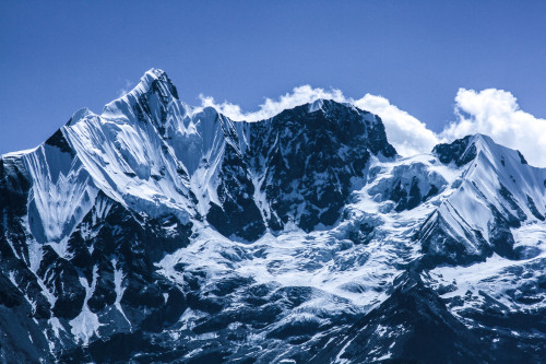 Snow Textures by Dan ScottiTaken in the Annapurna mountain range in Nepal on Society6