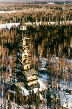 archiemcphee:This awesome structure is a house located in the southern wilds of Alaska, somewhere between the areas known as Willow and Talkeetna. According to locals, the original owner built the bottommost level shortly after a forest fire, which meant