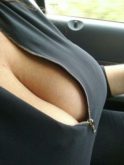 smushedbreasts:  Smushed in a tight zip up top!   Hot slutty tits