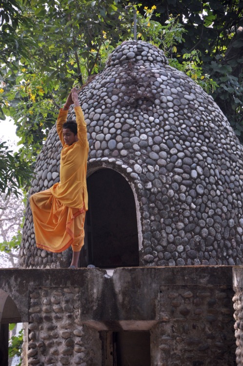 heroinsight:  an Indian devotee practices yoga at the Beatles ashram as the former ashram of the Mah