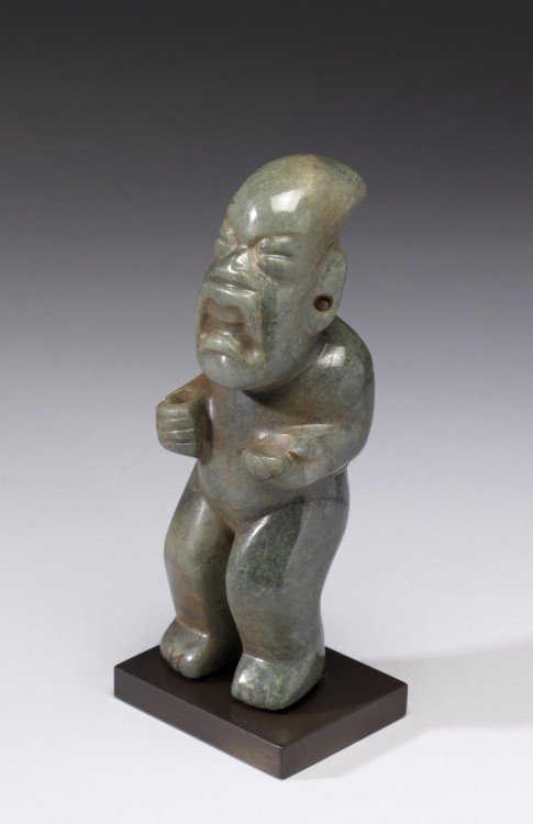 Jadeite figure, made by the Olmec. Date unknown. It looks a bit like a whining child, no?