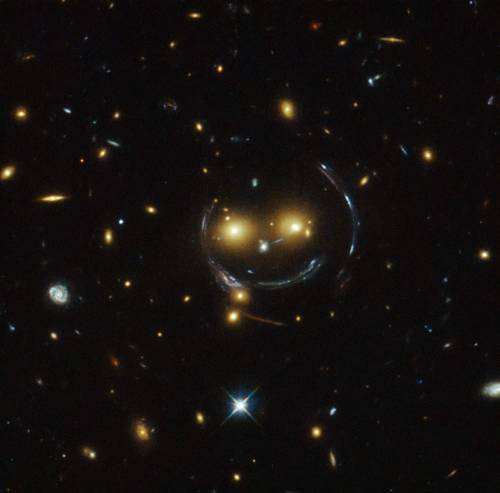 science-junkie: timemagazine:The Hubble Telescope just spotted a smiley face in outer spacePhot