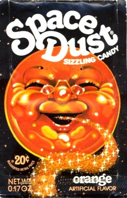 twentiethcenturykid:  KIDS CANDY CULTURE Orange Flavored Space Dust Circa 1975 The Glam Rocker Of The Candy World! 